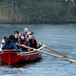 The Virgin Media Apprentice team rowing hard